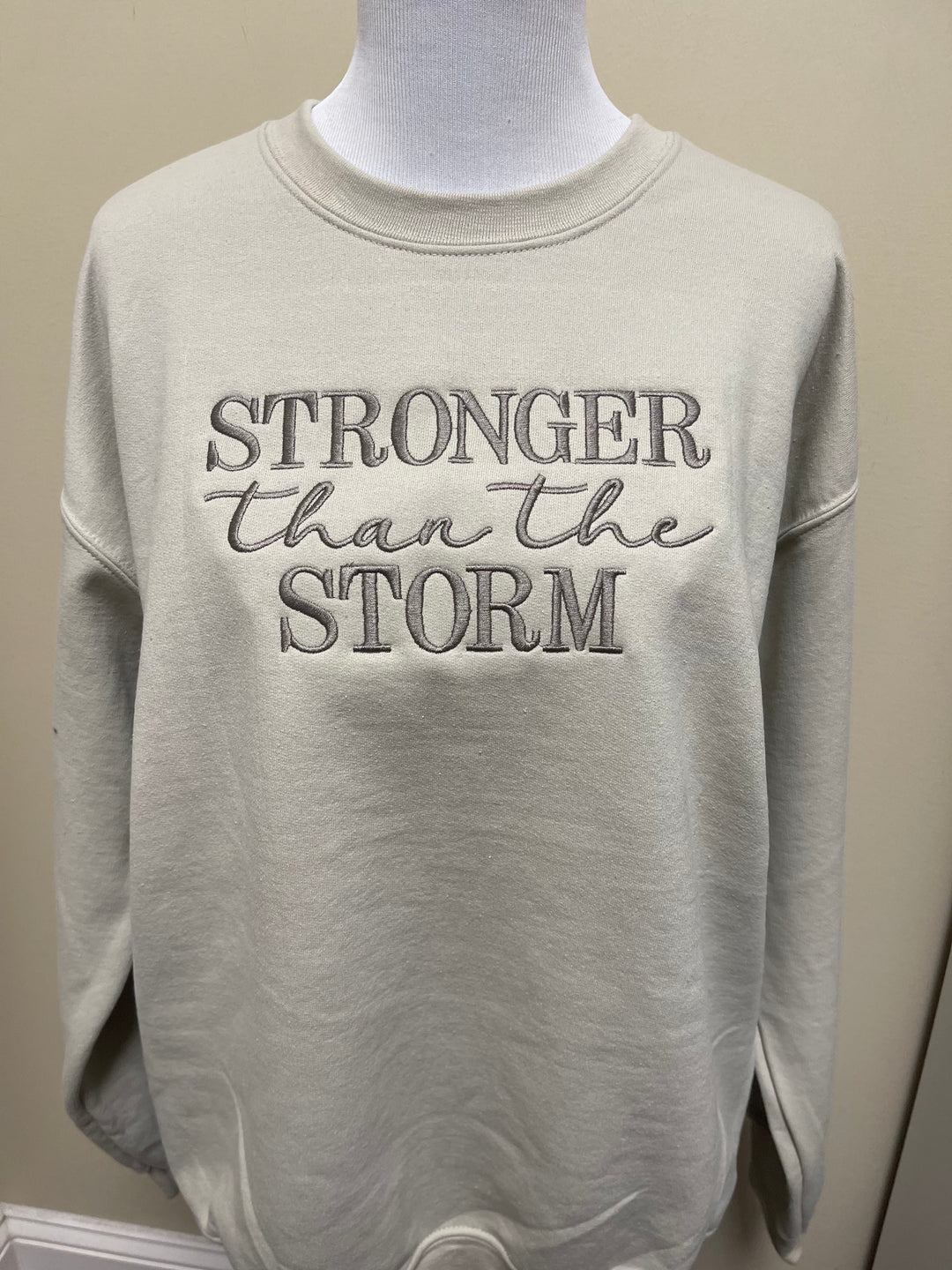 Stronger than the storm embroidered sweatshirt
