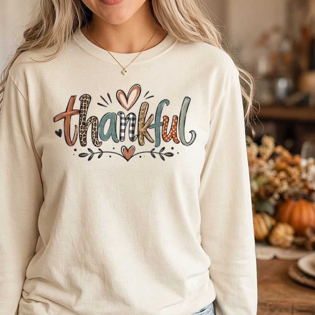 Thankful Leopard Heart Script Leaves DTF transfer shown on a Comfort Colors long sleeve tee