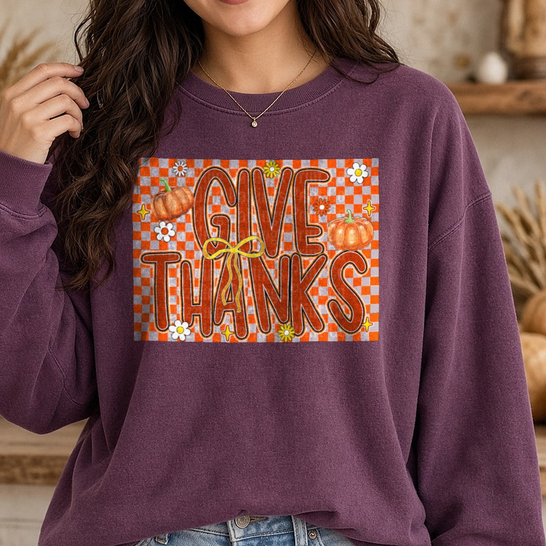 Checkered Give Thanks DTF transfer shown on a Comfort Colors sweatshirt