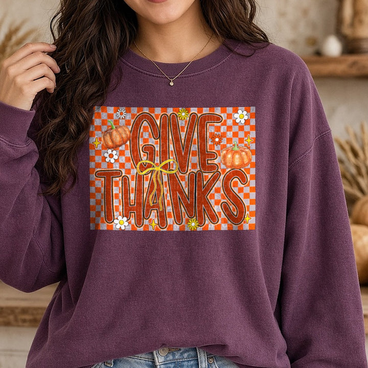 Checkered Give Thanks DTF transfer shown on a Comfort Colors sweatshirt