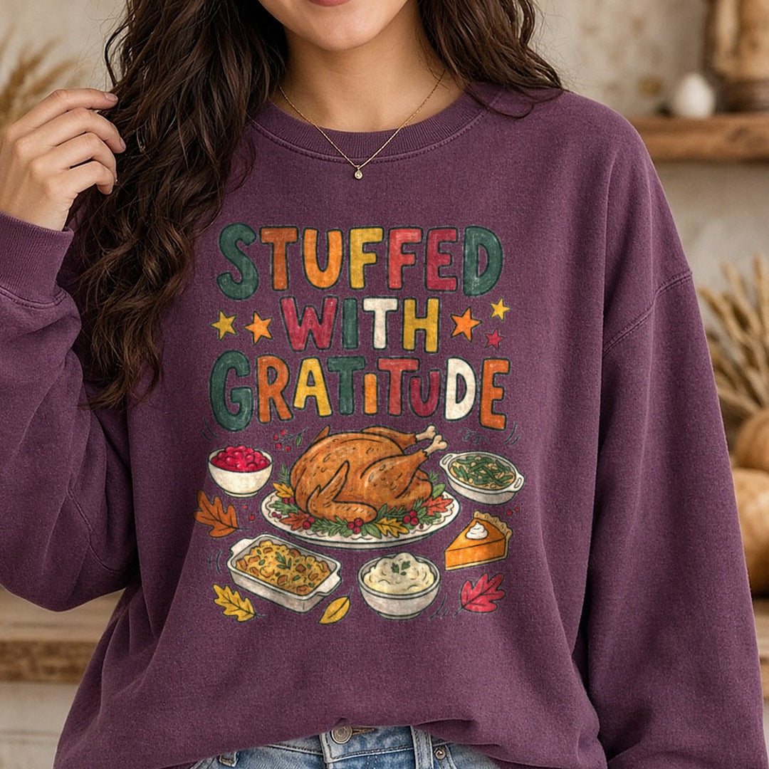 Stuffed With Gratitude DTF transfer shown on a Comfort Colors sweatshirt