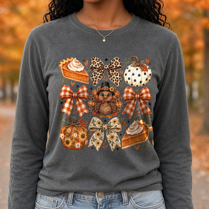 Cartoon Pumpkin, Pie and Bows DTF transfer shown on a Comfort Colors long sleeve tee