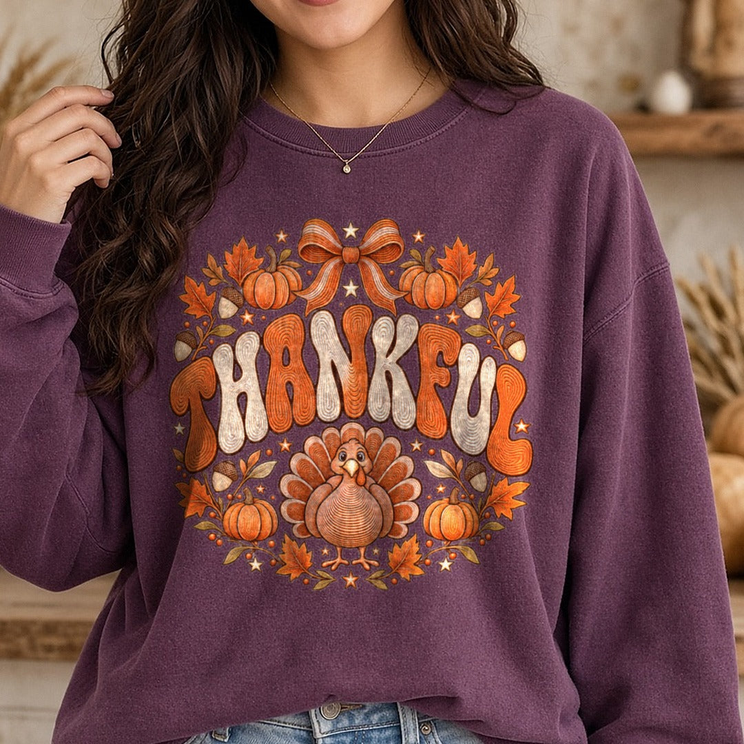 Thankful leaves and pumpkin DTF transfer shown on a Comfort Colors sweatshirt