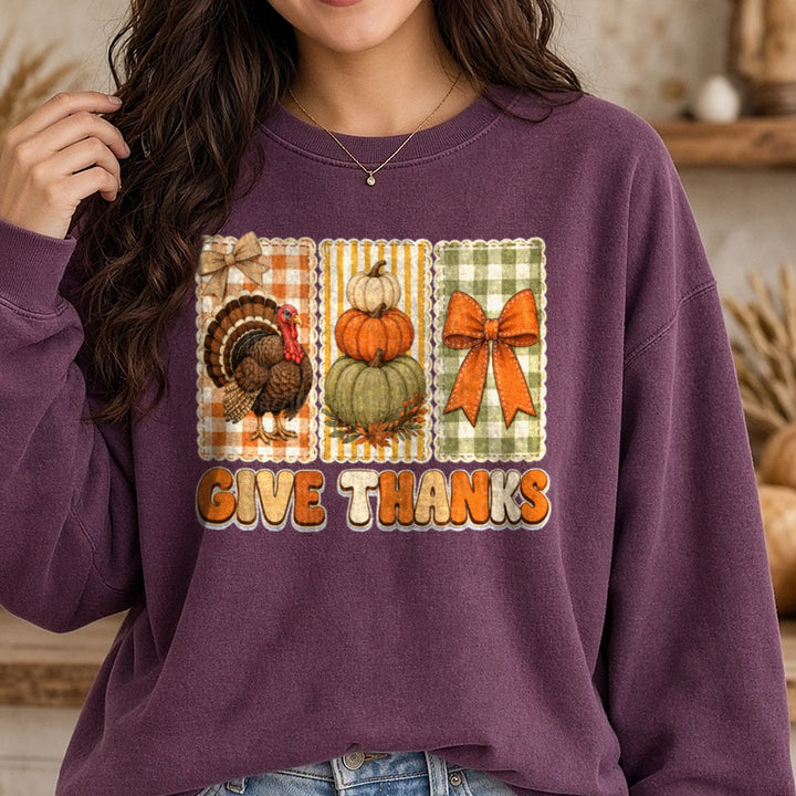 Give Thanks Gingham DTF transfer shown on a Comfort Colors sweatshirt