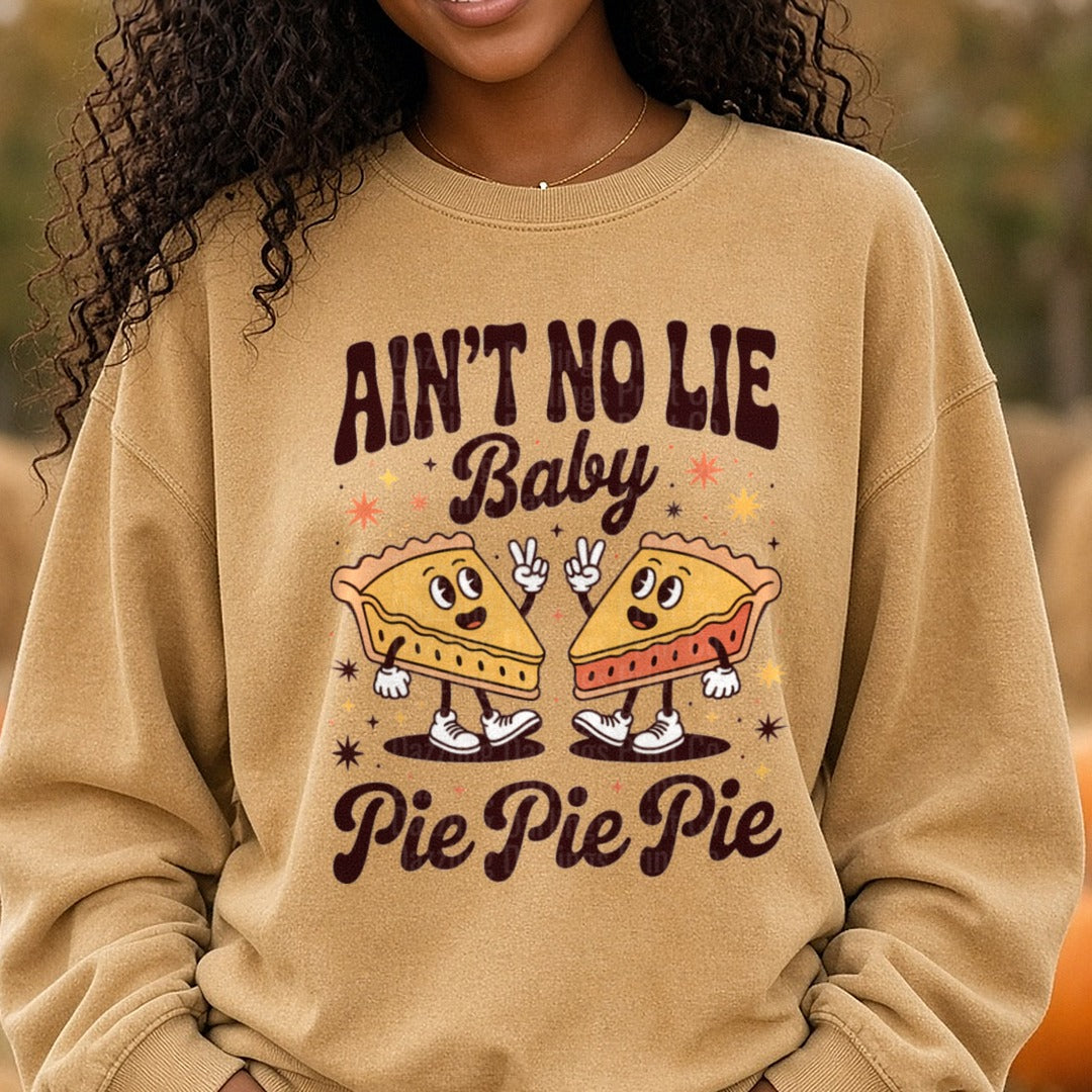 Ain't No Lie Baby Pie Pie Pie DTF transfer shown on a Comfort Colors sweatshirt