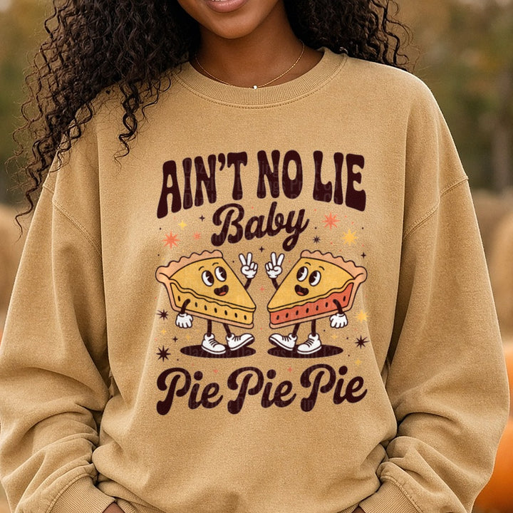 Ain't No Lie Baby Pie Pie Pie DTF transfer shown on a Comfort Colors sweatshirt