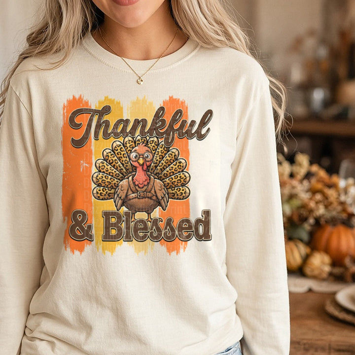 Striped Thankful & Blessed DTF transfer shown on a Comfort Colors long sleeve tee