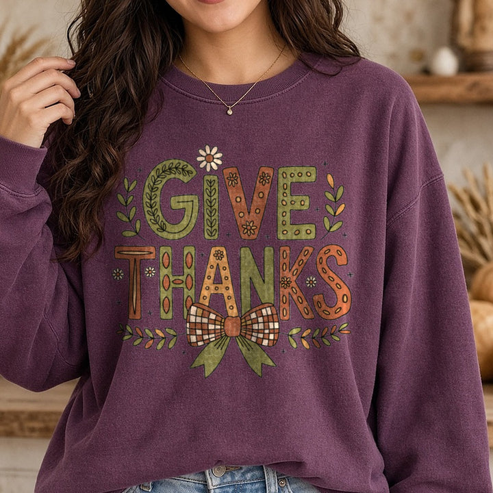 Give Thanks DTF transfer shown on a Comfort Colors sweatshirt