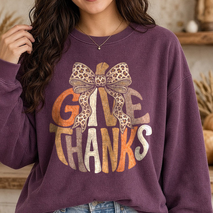 Give Thanks Pumpkin DTF transfer shown on a Comfort Colors sweatshirt