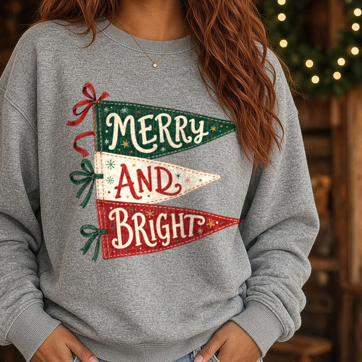 Merry and Bright Pennant DTF transfer shown on a Comfort Colors sweatshirt