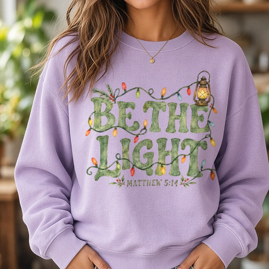 Be The Light DTF transfer shown on a Comfort Colors sweatshirt