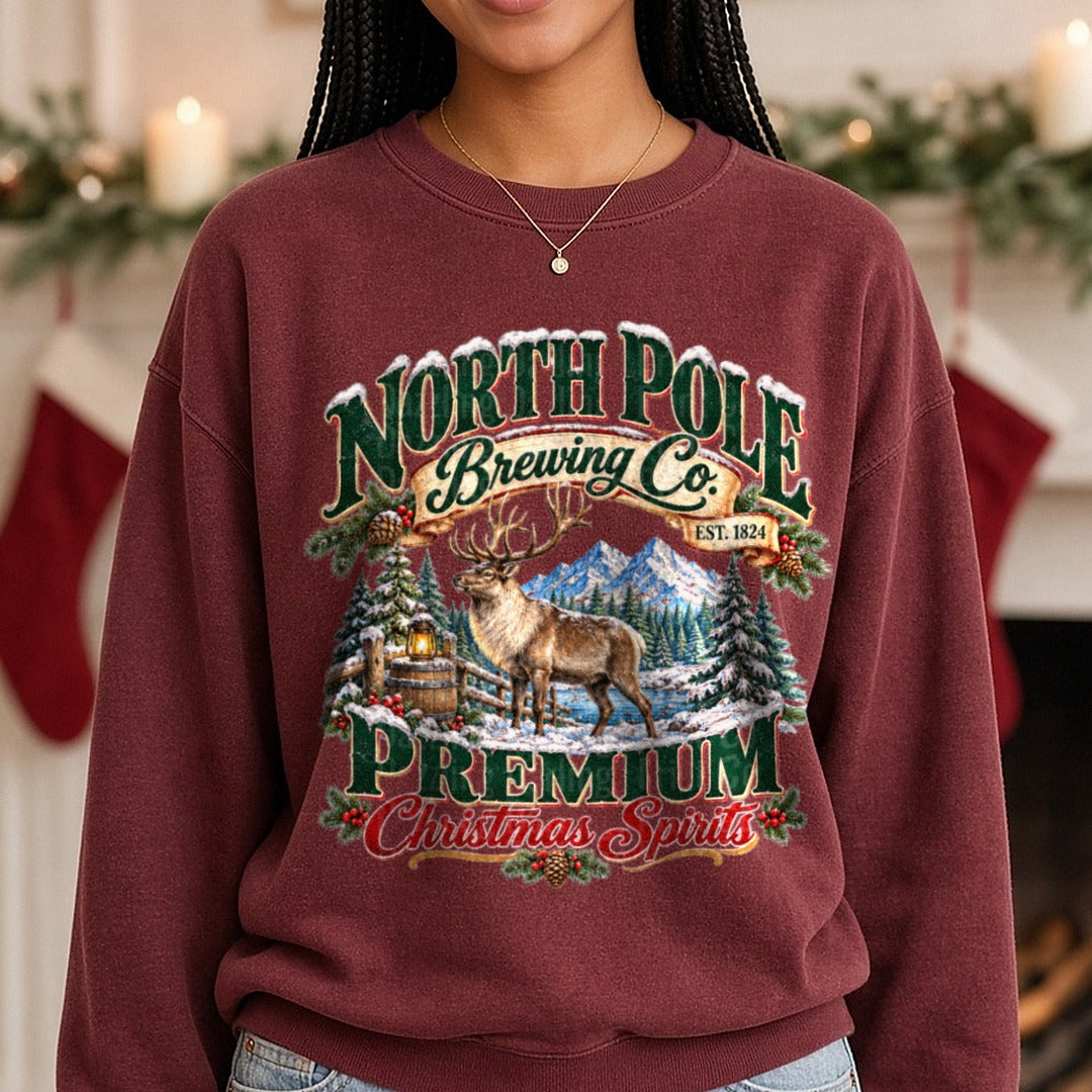 North Pole Brewing Co Premium DTF transfer shown on a Comfort Colors sweatshirt