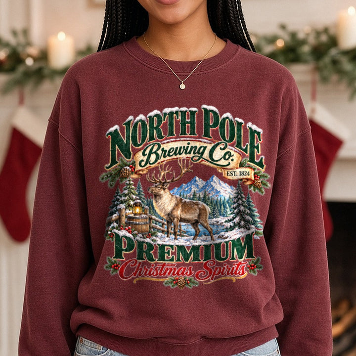 North Pole Brewing Co Premium DTF transfer shown on a Comfort Colors sweatshirt