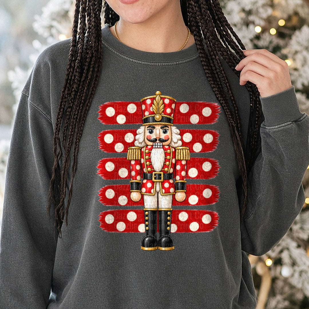 Striped Polkadot Nutcracker DTF transfer shown on a Comfort Colors sweatshirt