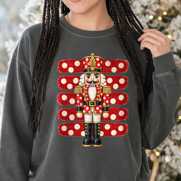 Striped Polkadot Nutcracker DTF transfer shown on a Comfort Colors sweatshirt