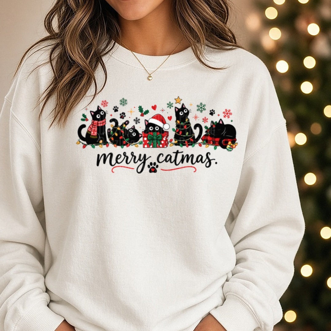 Merry Catmas Black Cat DTF transfer shown on a Comfort Colors sweatshirt