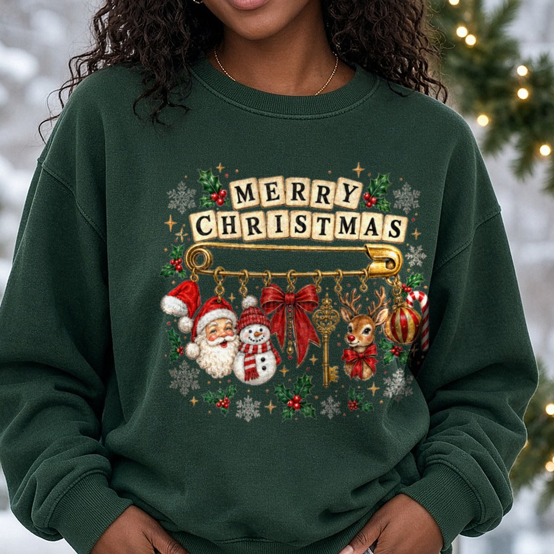 Merry Christmas Safety Pin Charm Bracelet DTF transfer shown on a Comfort Colors sweatshirt
