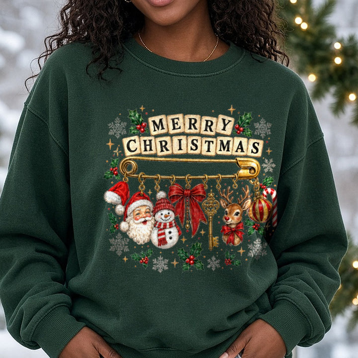Merry Christmas Safety Pin Charm Bracelet DTF transfer shown on a Comfort Colors sweatshirt
