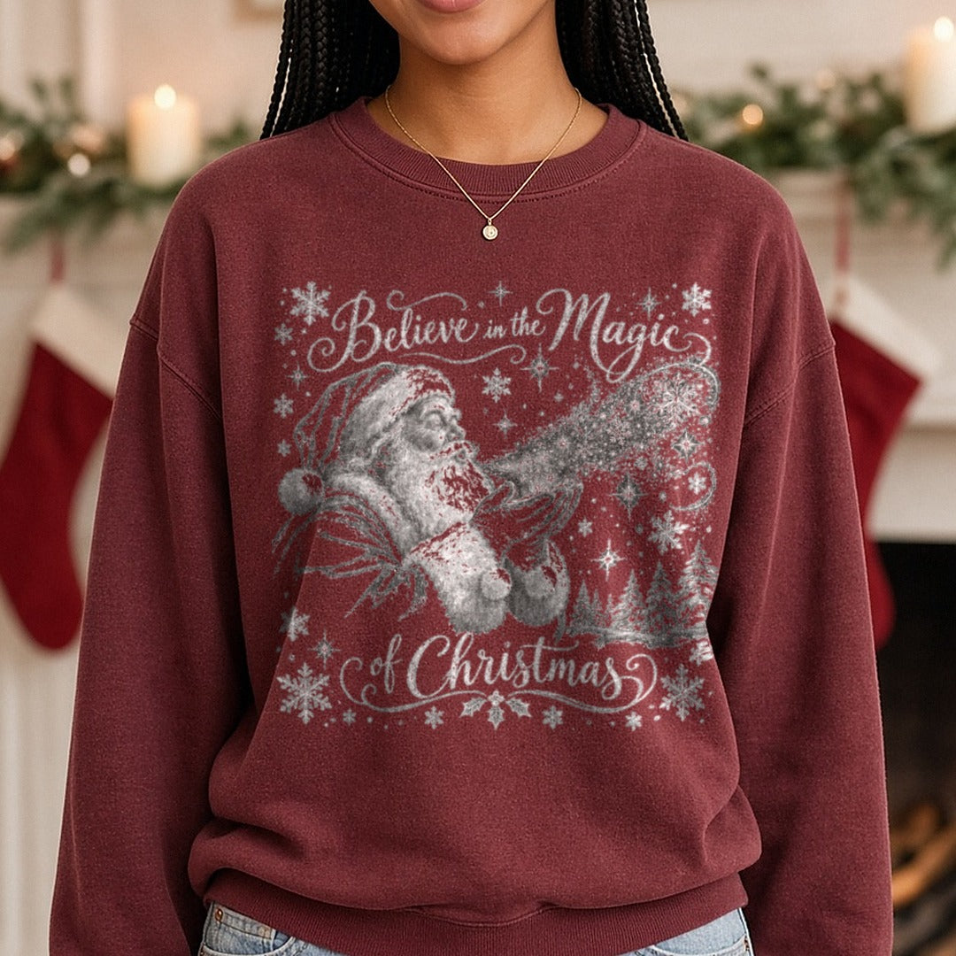 Believe in the Magic Of Christmas White DTF transfer shown on a Comfort Colors sweatshirt