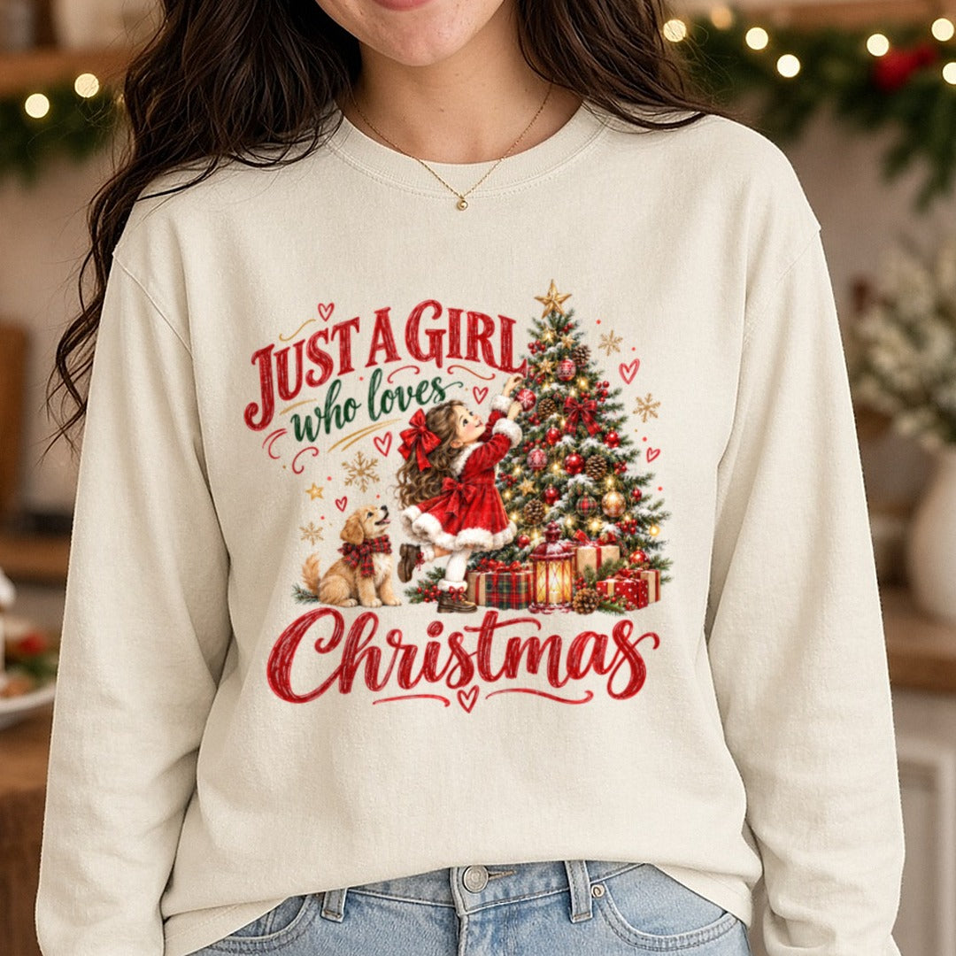 Just A Girl Who Loves Christmas Vintage Girl Tree Puppy Script DTF transfer shown on a Comfort Colors long sleeve tee