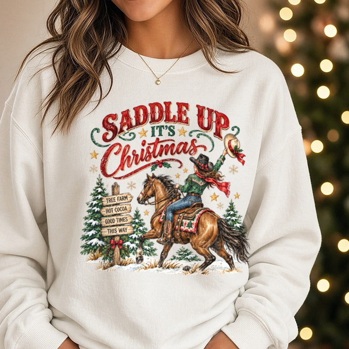 Saddle Up It's Christmas DTF transfer shown on a Comfort Colors sweatshirt
