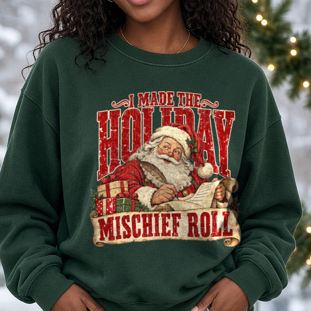 I Made the Holiday Mischief Roll DTF transfer shown on a Comfort Colors sweatshirt