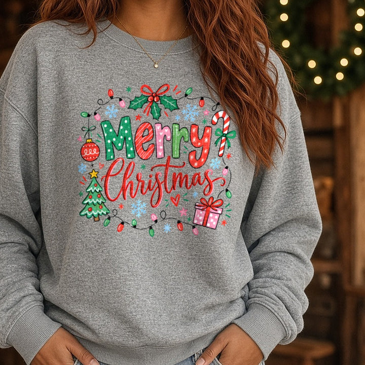 Merry Christmas with lights DTF transfer shown on a Comfort Colors sweatshirt