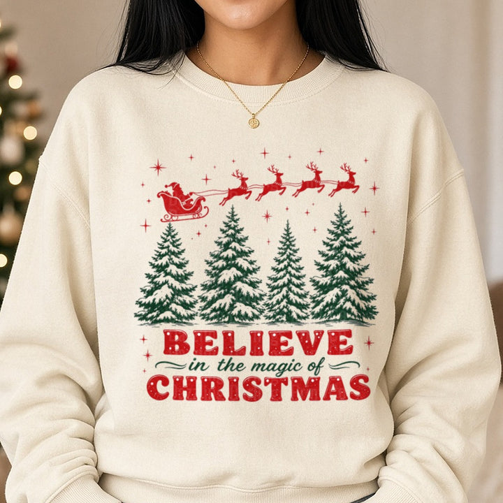 Believe in the Magic of Christmas Santa Sleigh DTF transfer shown on a Comfort Colors sweatshirt