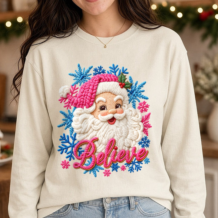 Pink and Blue Believe Santa DTF transfer shown on a Comfort Colors long sleeve tee
