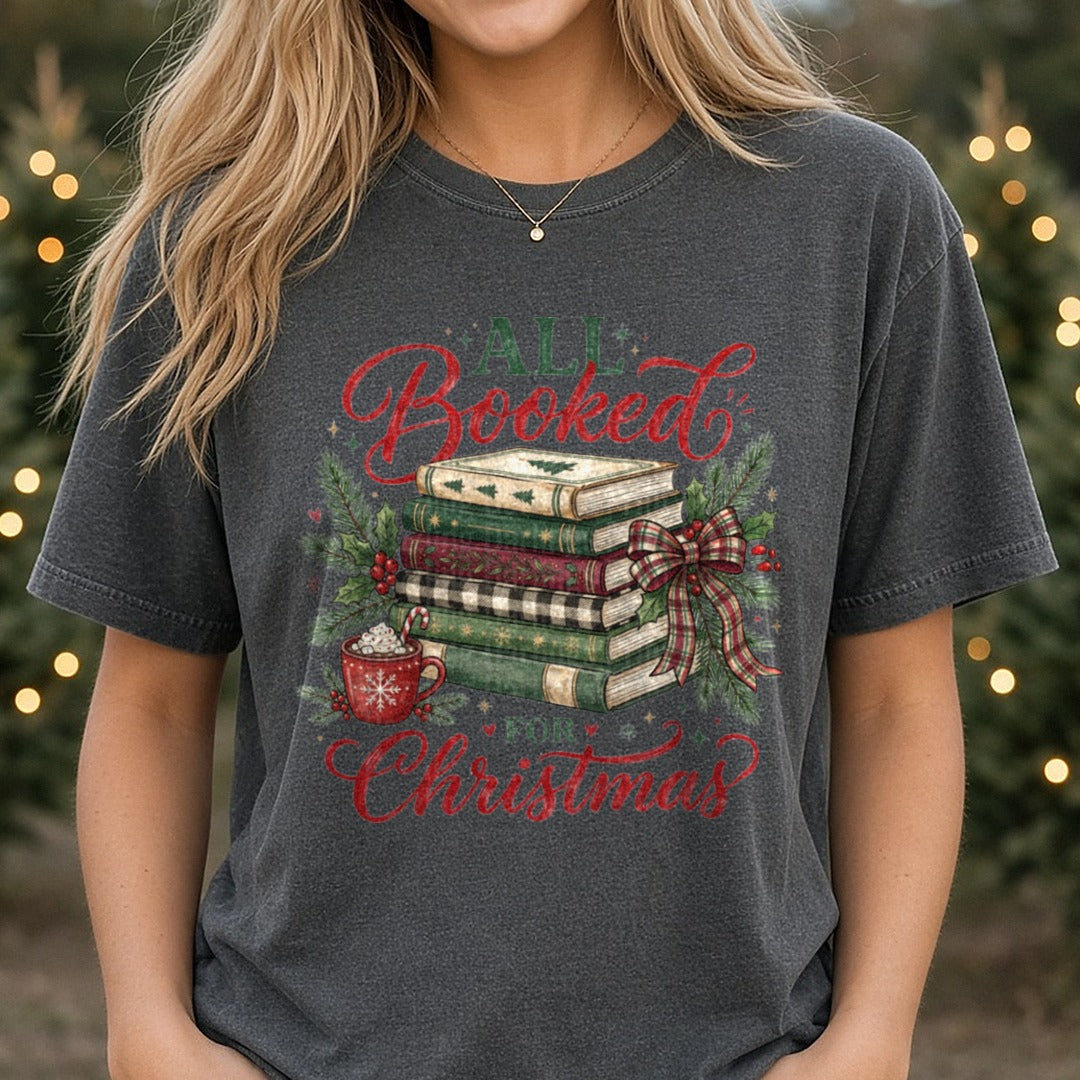 All Booked for Christmas DTF transfer shown on a Comfort Colors tee