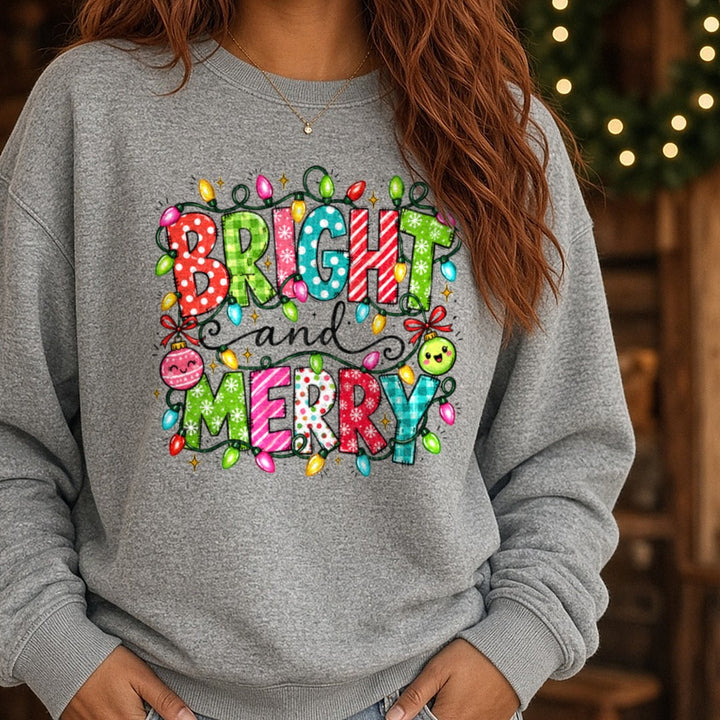 Colorful Merry and Bright DTF transfer shown on a Comfort Colors sweatshirt