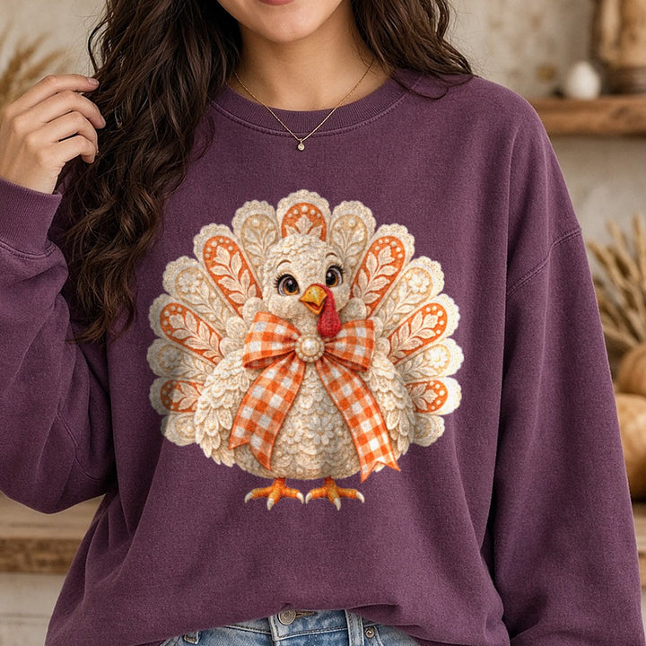 Orange and White Lace Turkey DTF transfer shown on a Comfort Colors sweatshirt