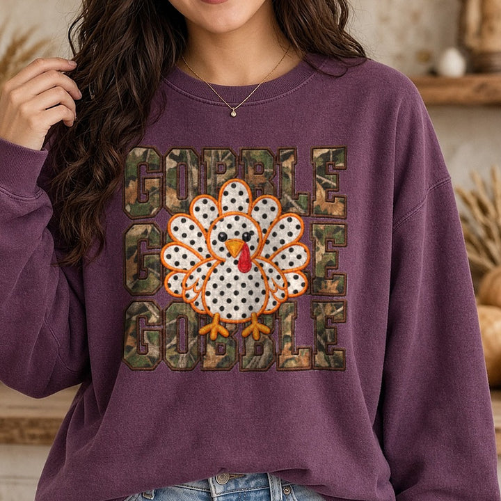 Camo Gobble Embroidery DTF transfer shown on a Comfort Colors sweatshirt