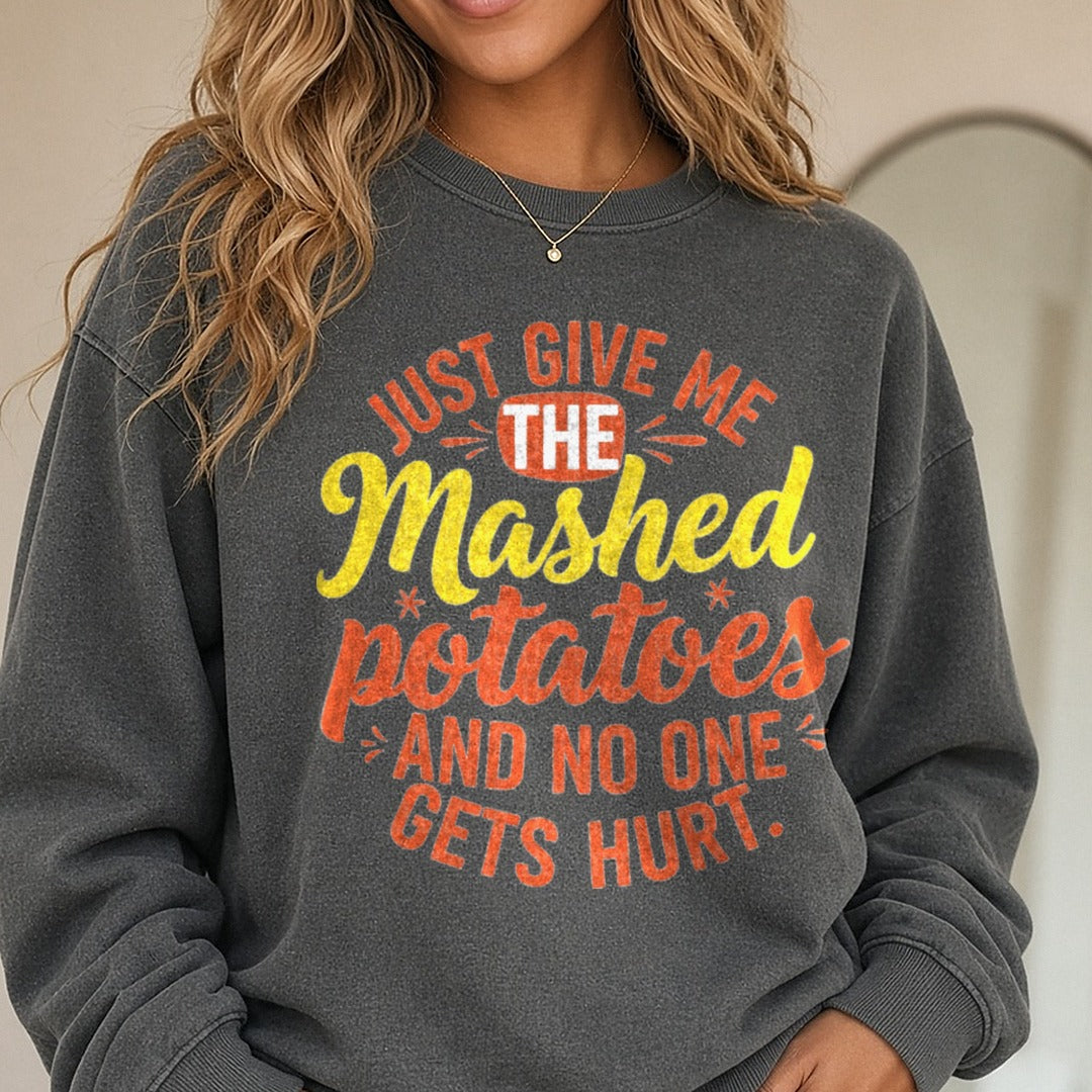 just Give Me The Mashed Potatoes DTF transfer shown on a Comfort Colors sweatshirt