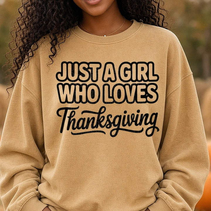 Just A Girl Who Loves Thanksgiving DTF transfer shown on a Comfort Colors sweatshirt