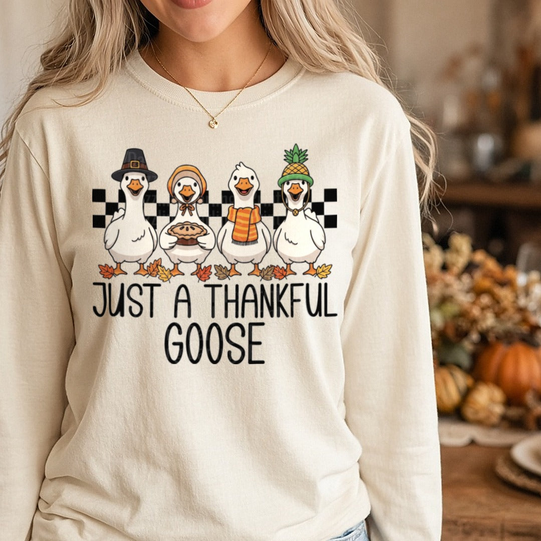 Just A Thankful Goose Pilgrim Geese Checkered Pie DTF transfer shown on a Comfort Colors long sleeve tee
