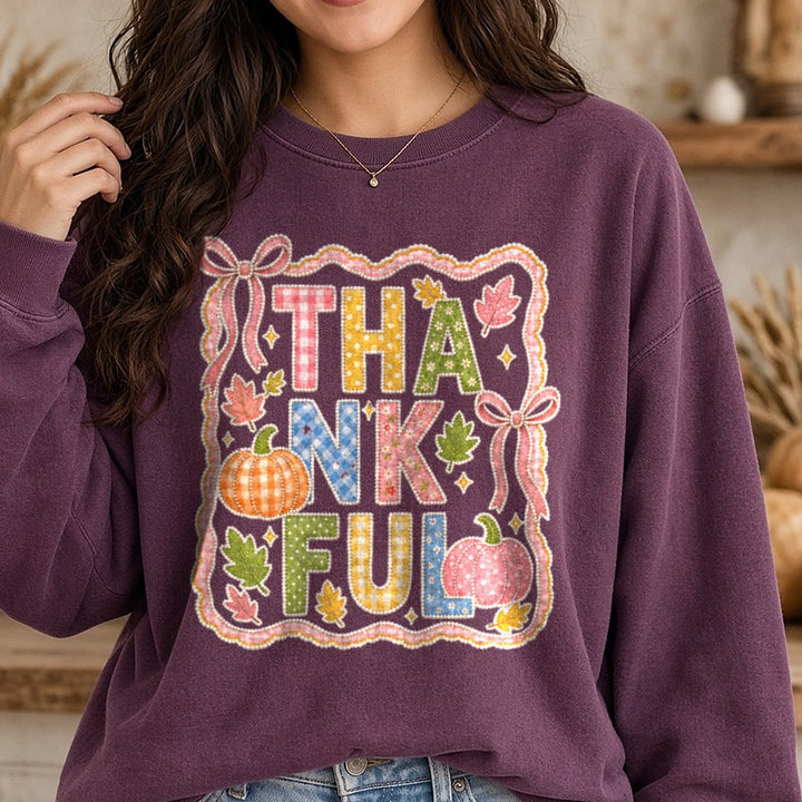 Colorful Thankful DTF transfer shown on a Comfort Colors sweatshirt