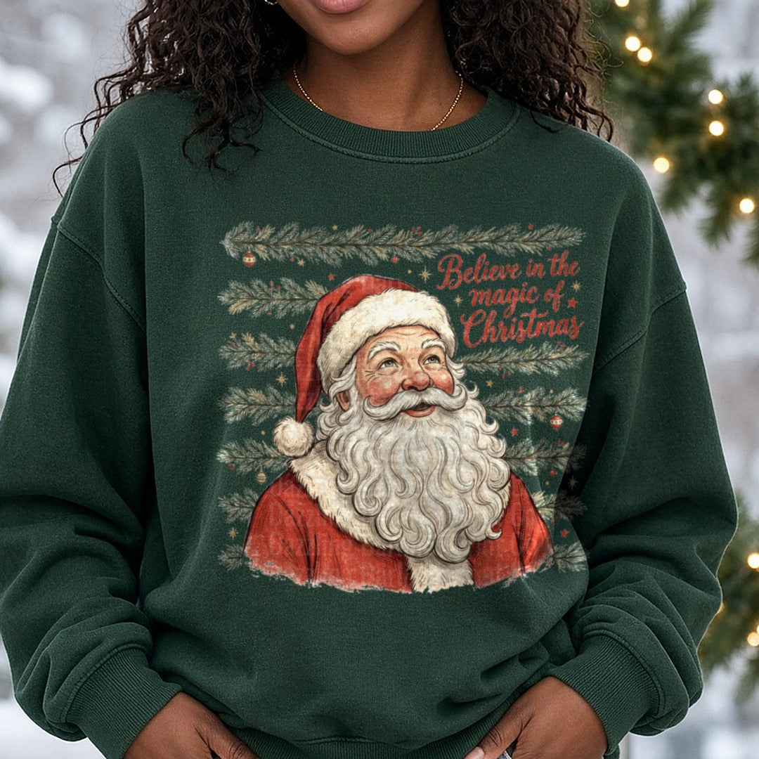 Believe In The Magic Of Christmas Santa Portrait Pine Garland DTF transfer shown on a Comfort Colors sweatshirt