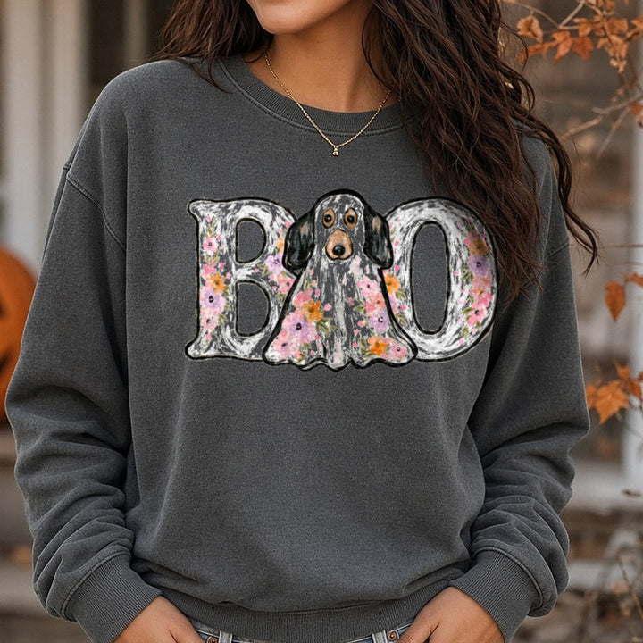 Floral BOO Ghost Dog Halloween Typography Design DTF transfer shown on a Comfort Colors sweatshirt