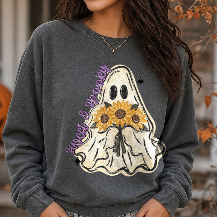 Sheet & Spooky Ghost Holding Sunflower Bouquet DTF transfer shown on a Comfort Colors sweatshirt