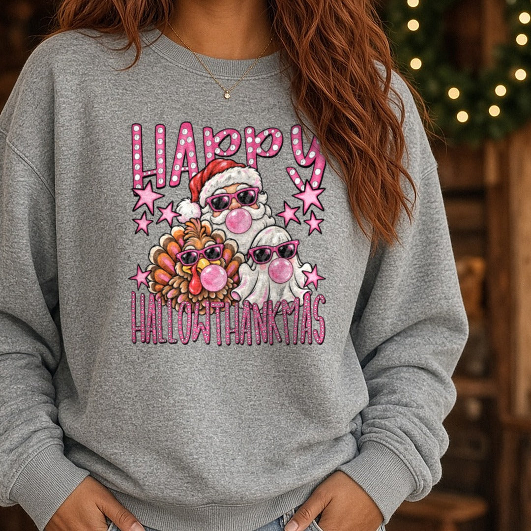 Happy Hallowthankmas Santa Turkey Ghost Pink Bubble Gum DTF transfer shown on a Comfort Colors sweatshirt
