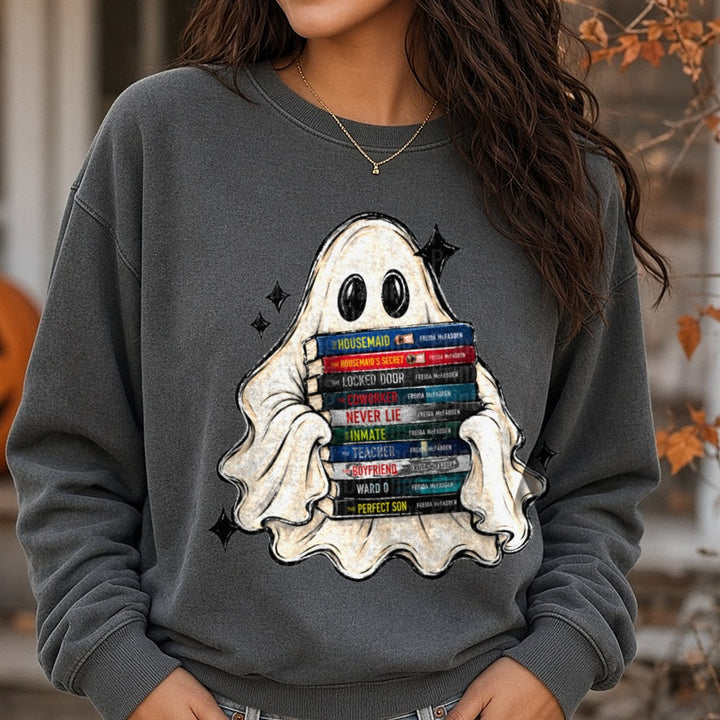 Cute Ghost Hugging Freida McFadden Book Stack DTF transfer shown on a Comfort Colors sweatshirt