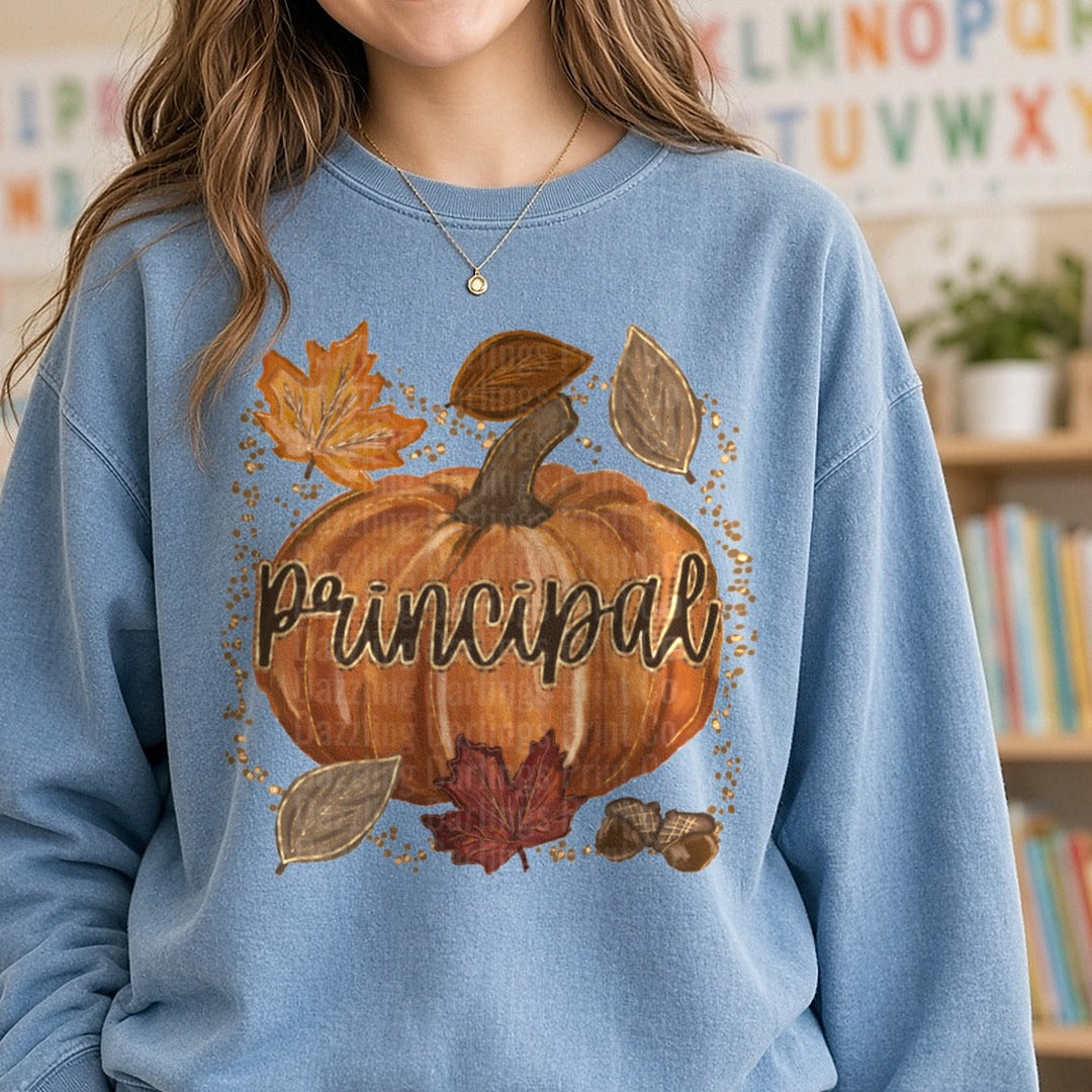 Fall Pumpkin Principal Autumn Leaves Acorns Gold Glitter DTF transfer shown on a Comfort Colors sweatshirt