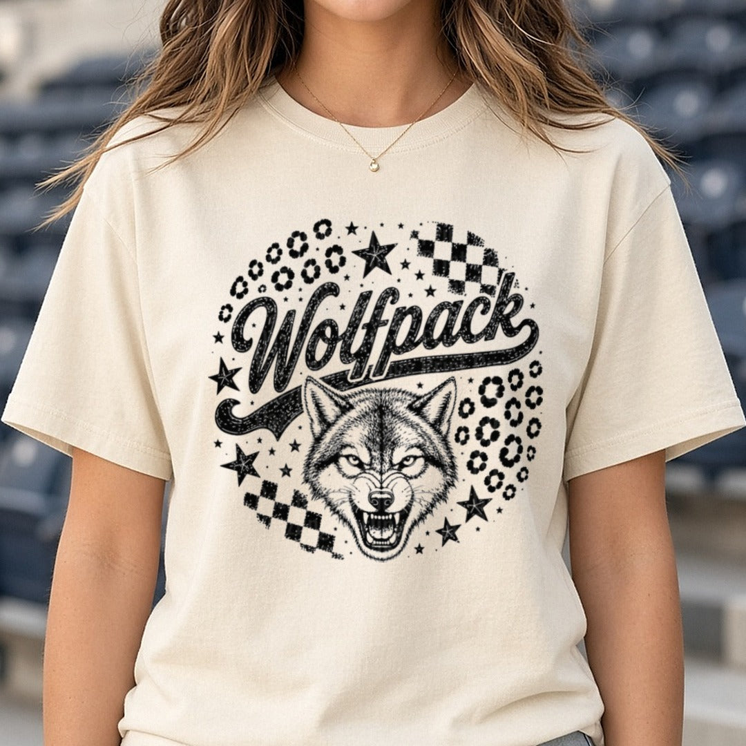 Wolfpack Growling Wolf Script Stars Checkered Leopard Print DTF transfer shown on a Comfort Colors tee