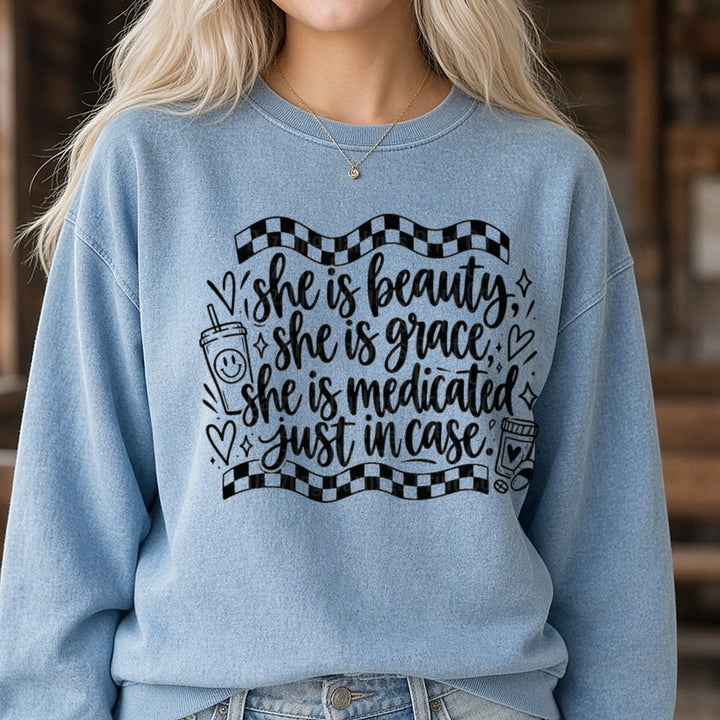 She Is Beauty She Is Grace She Is Medicated Just In Case DTF transfer shown on a Comfort Colors sweatshirt