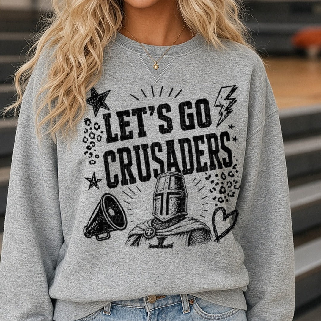Let's Go Crusaders Knight Helmet Spirit Cheer Design DTF transfer shown on a Comfort Colors sweatshirt