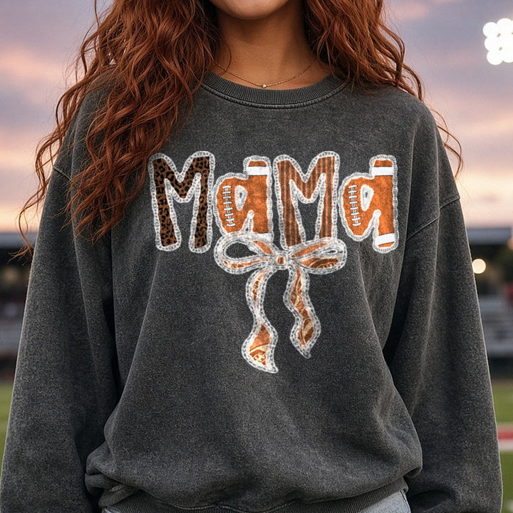 Football Mama Lace Coquette Bow DTF transfer shown on a Comfort Colors sweatshirt