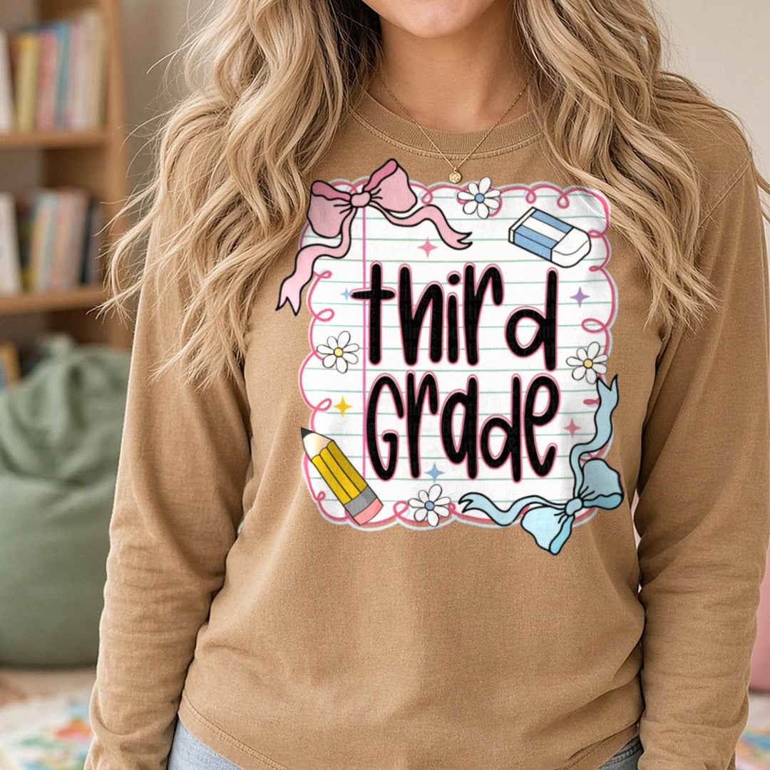 Back To School Transfer Third Grade Notebook Paper Pink Bow Pencil DTF transfer shown on a Comfort Colors long sleeve tee