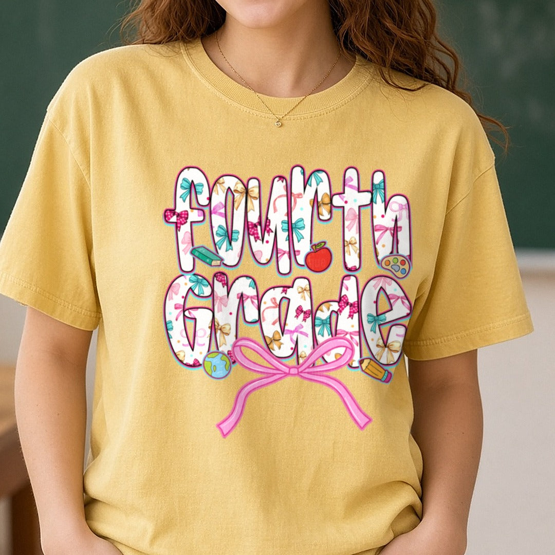 Back To School Fourth Grade Floral Letters Pink Bow Apple DTF transfer shown on a Comfort Colors tee