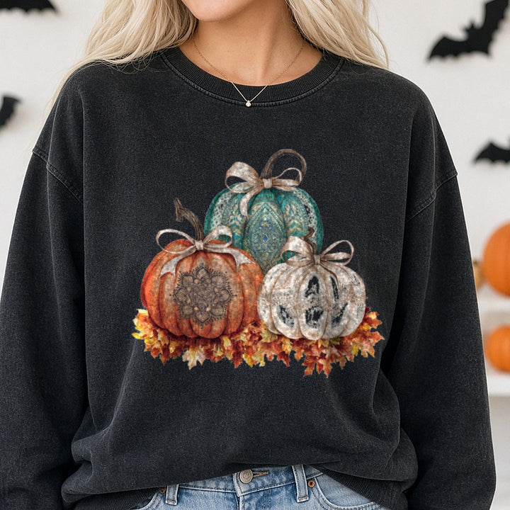 Halloween Fall Pumpkin Teal Mandala Bows Leaves DTF transfer shown on a Comfort Colors sweatshirt